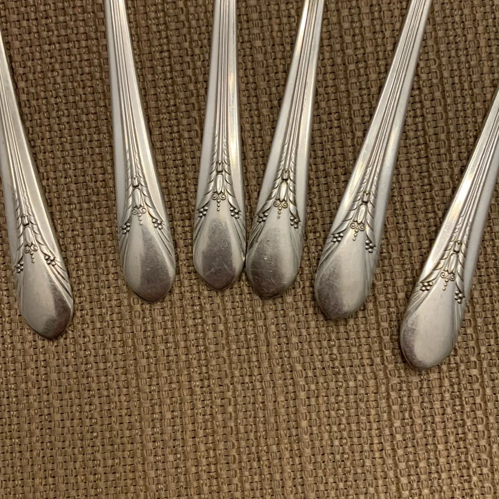 Vintage silver spreader knives